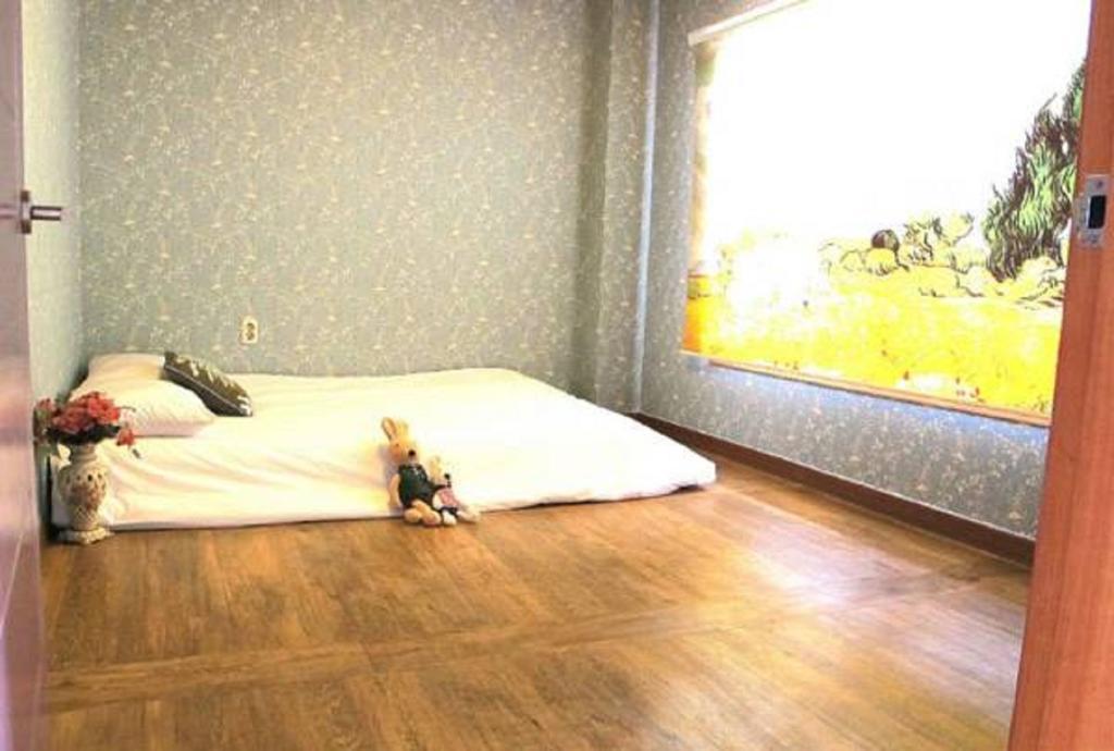 Dg Beach Pension Jeju Room photo